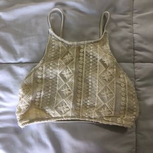 Cream colored high neck swim top